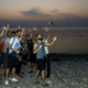 Image for article titled Syrian refugees celebrate a risky journey to Greece with an amazing selfie-stick photo